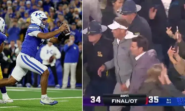 Lane Kiffin escorted off field by police as Kentucky fans storm field after upset win