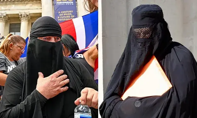 Anti-migrant protester arrives at court in burqa to deny face-covering ban charge
