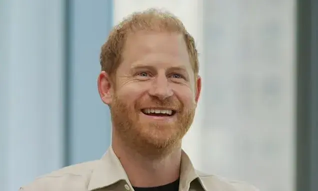 Prince Harry says he 'wants it to work out' with his family... but takes a jab at those who 'don't want to'