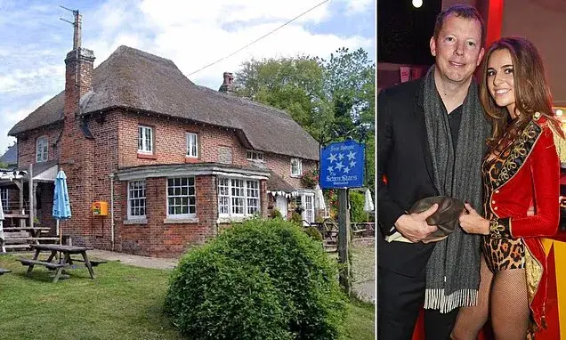 Former glamour model married to super-rich Rothschild dynasty heir sparks row with bid to turn 16th century village pub into boutique hotel