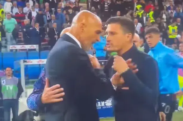Football boss threatens to 'slap' rival after claiming he 'just wanted a hug' in sideline brawl
