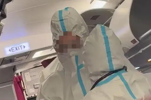 'Norovirus outbreak' on flight as ‘hazmat suits’ board plane with passengers hospitalised