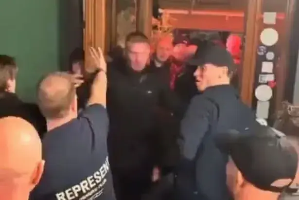 Man Utd fans fight each other in bloodstained bar brawl before Como hammering