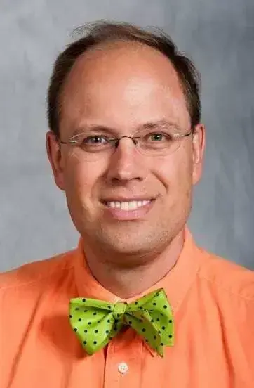 College professor arrested as campus's serial 'mystery sprinkler,' peed on student's backpack