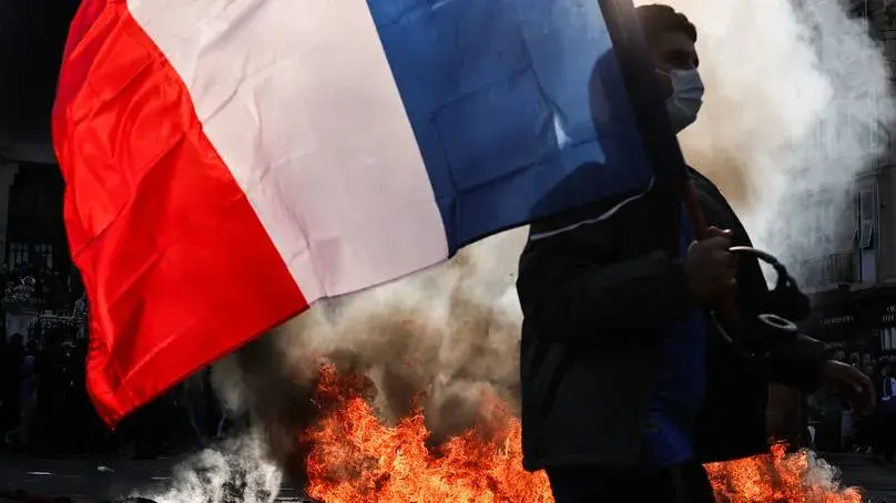 Half a million protesters in Paris; 2,400 arrests as riots spread across Europe