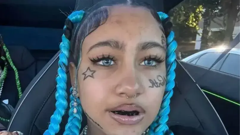 North West responds to 'demonic' accusations over face tattoos and piercings