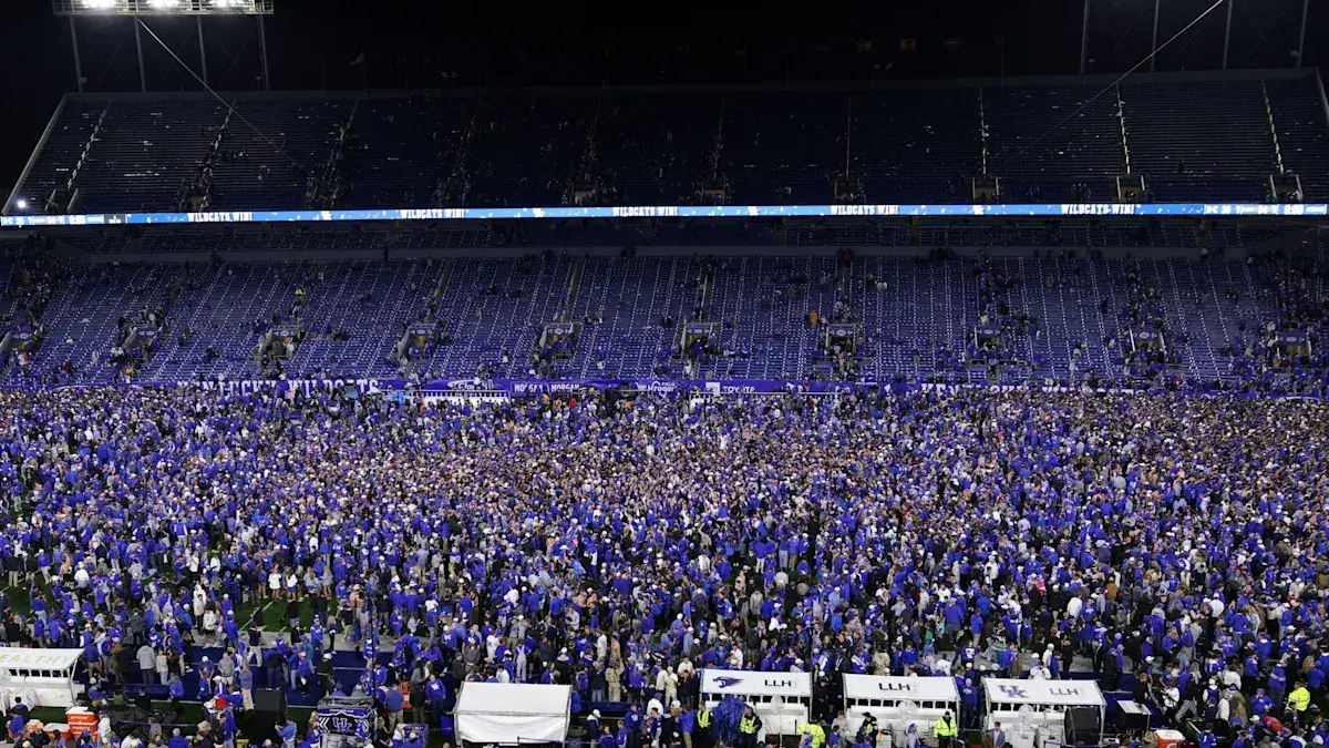 Kentucky fans storm field after upset win over LSU; Wildcats face fine