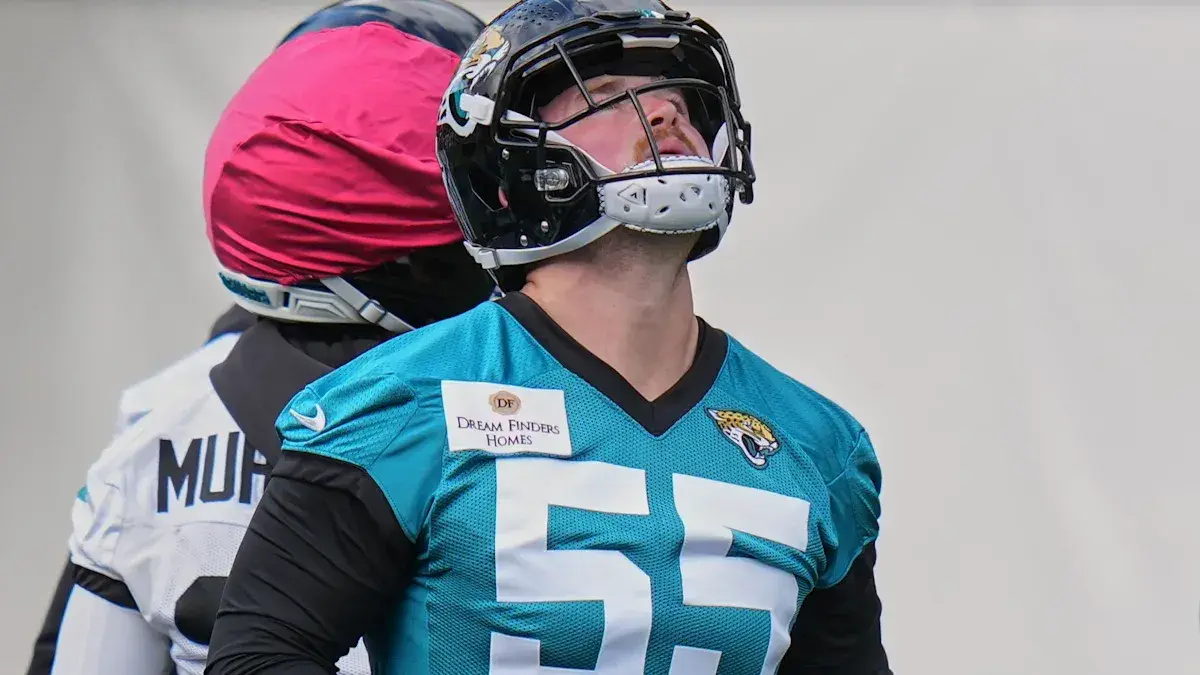 Long snapper cuts camping trip short, finds passport to sign with Jaguars in London